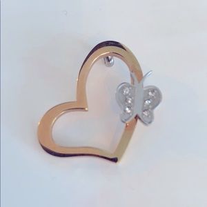 Goldtone heart and silver butterfly pendant